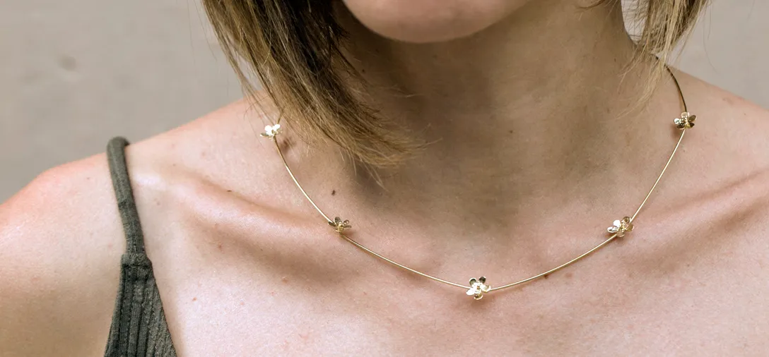 Collier fiori modulari in oro giallo 18kt